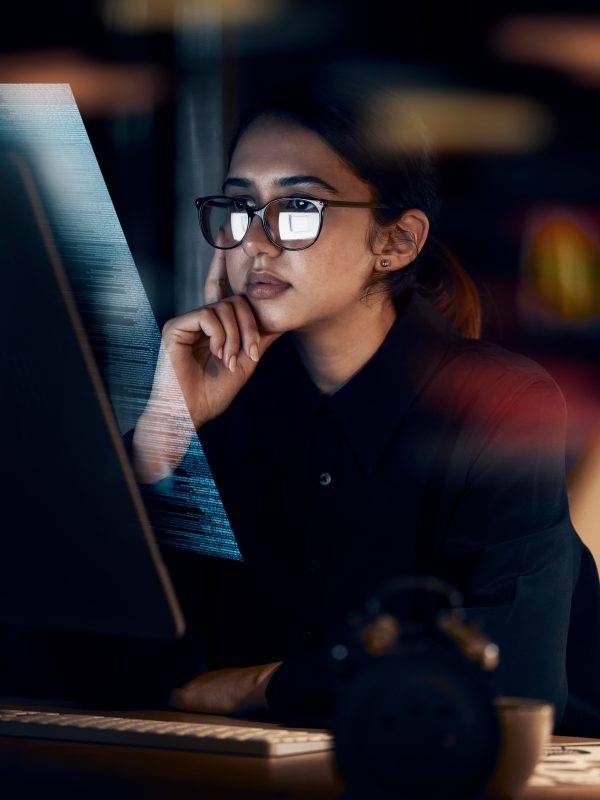 Programming, cybersecurity and thinking with woman at computer for software, idea and coding at nig.